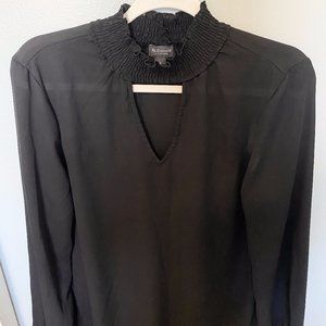 Long sleeve, sheer, peep-hole turtle neck blouse!